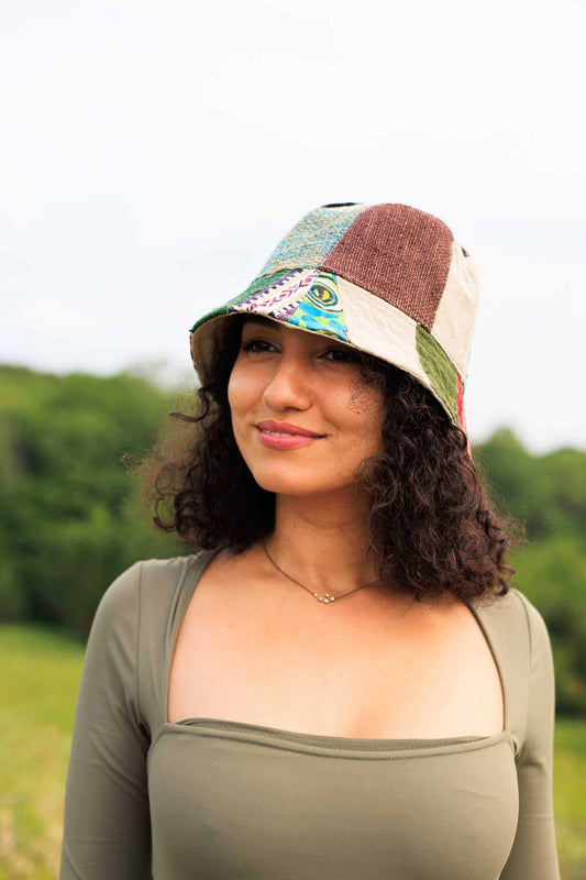 Eco-friendly hemp patchwork bucket hat worn outdoors.