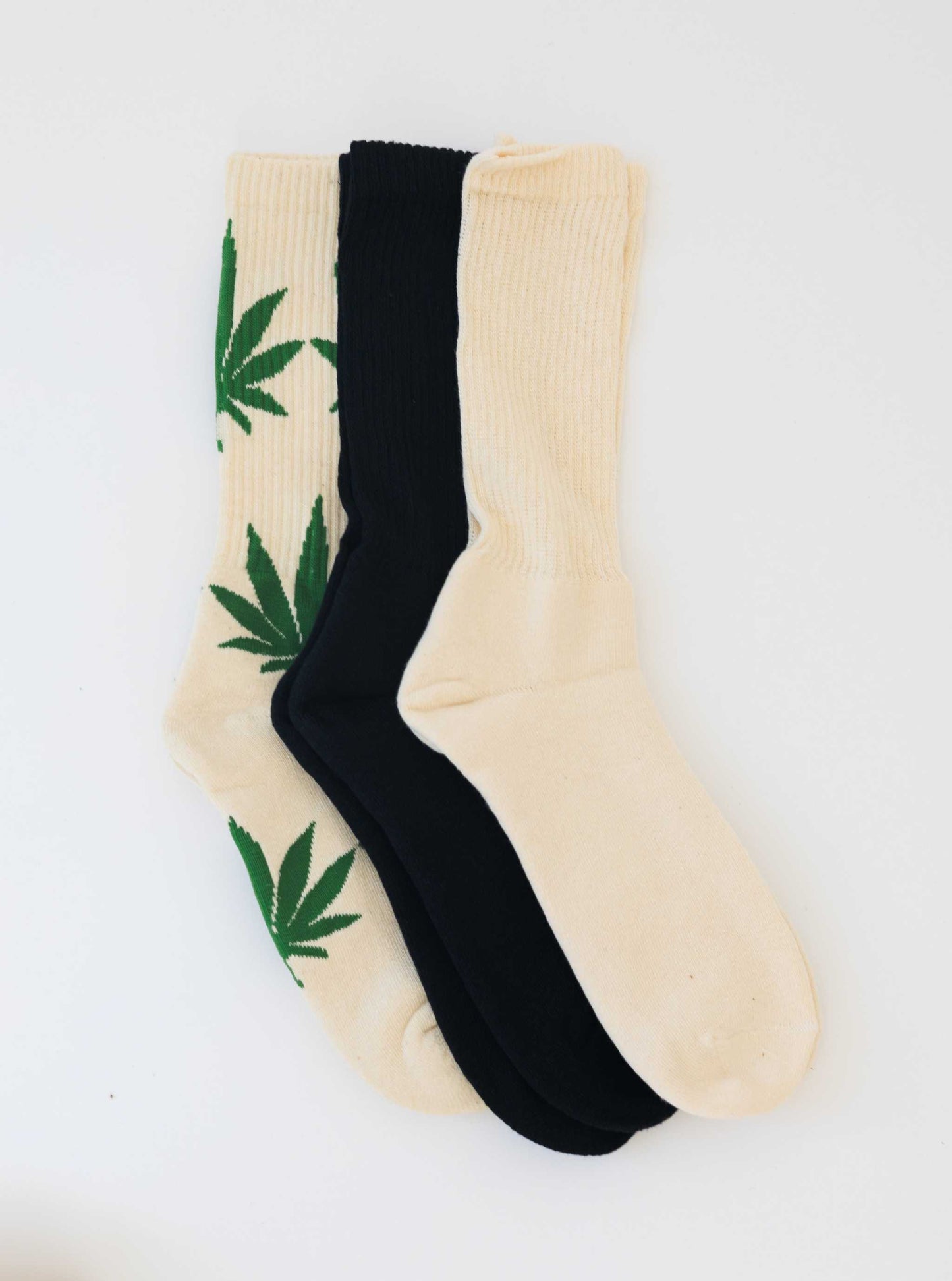 Women's hemp socks calf length in hemp leaf, black, and white colors, moisture-wicking and antibacterial organic cotton blend