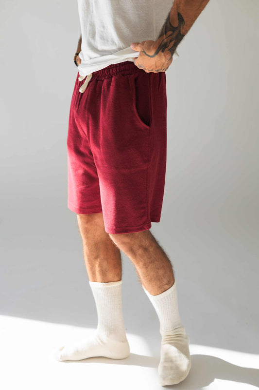 Men's burgundy hemp shorts with elastic waistband and pockets for gym, lounge, and casual wear