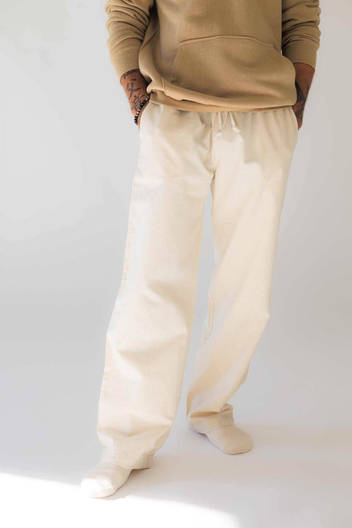 Eco-friendly hemp linen and organic cotton pants with relaxed fit and elastic waistband in linen white color