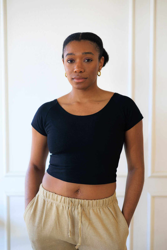 Stylish hemp cotton crop top in black, short sleeves, scoop neck, eco-friendly yoga wear.