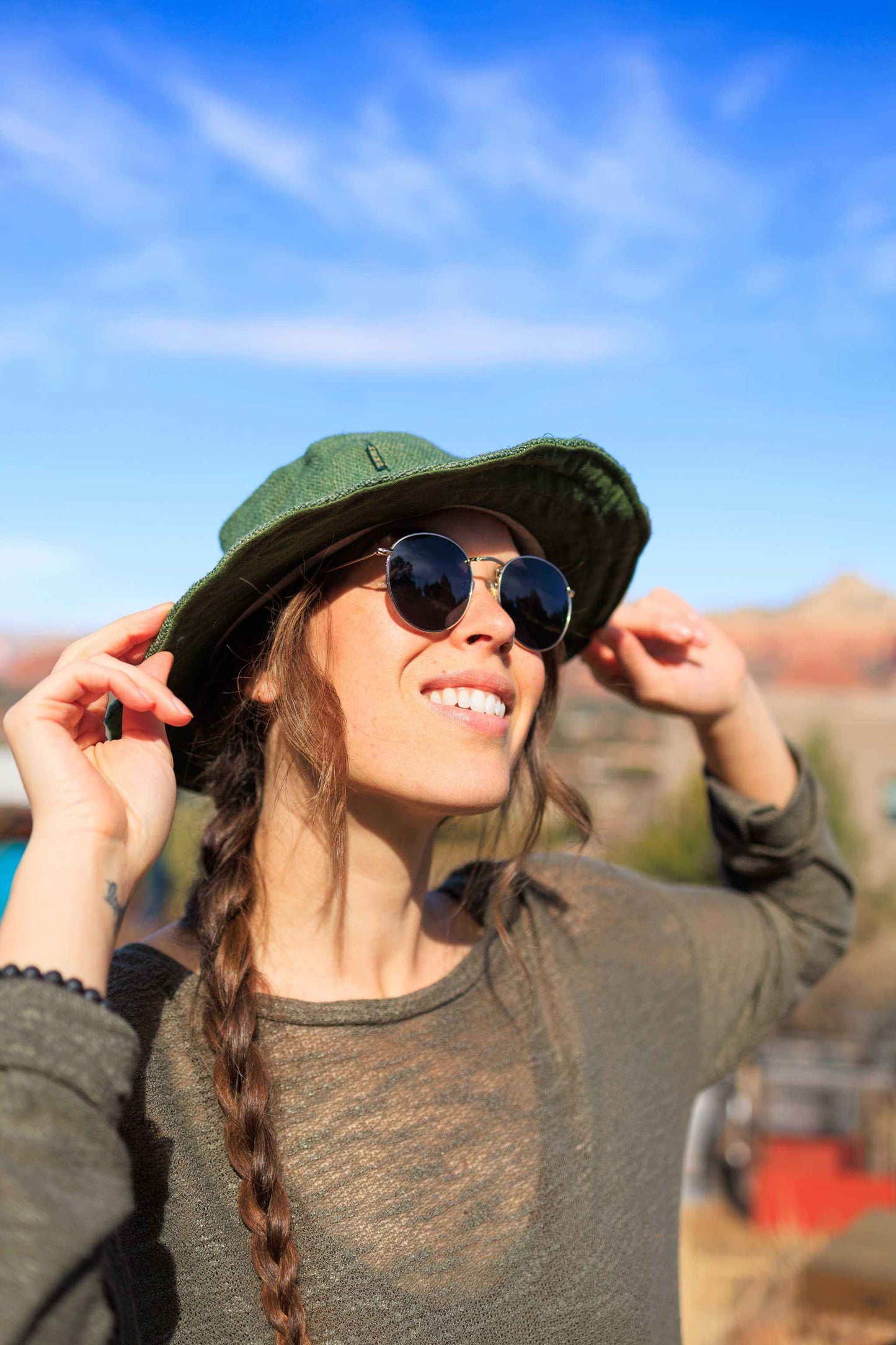 Eco-friendly handmade hemp hat in olive, featuring a wide brim for sun protection and breathable design.