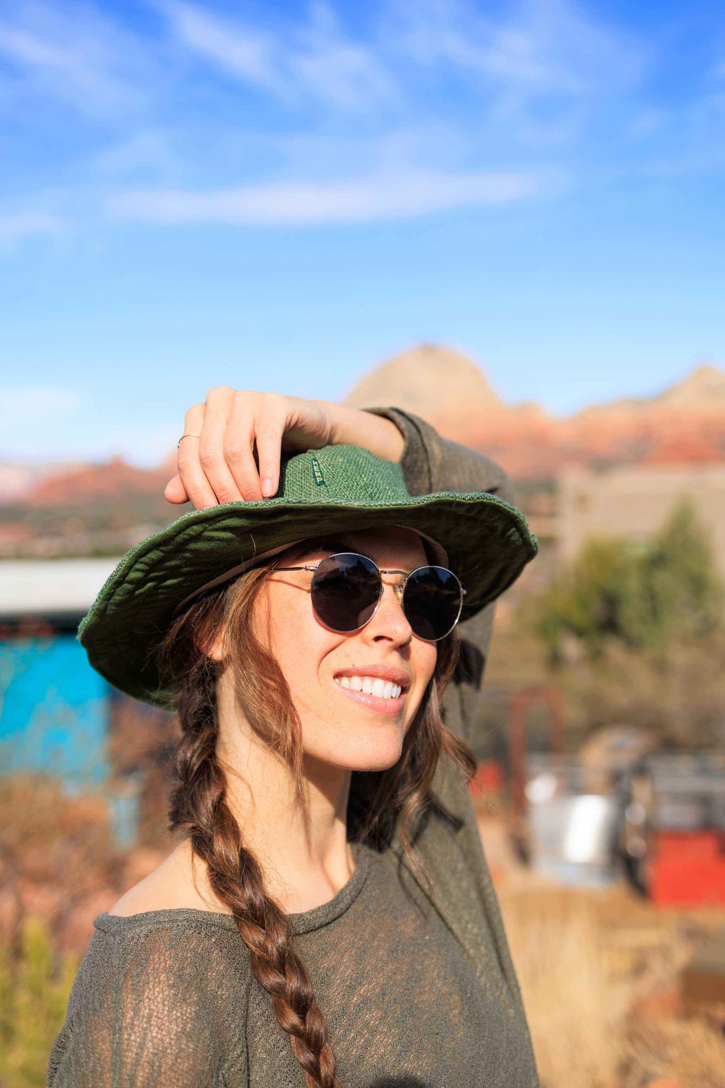 Eco-friendly handmade hemp hat in olive, offering wide-brim sun protection and breathable comfort for travel.