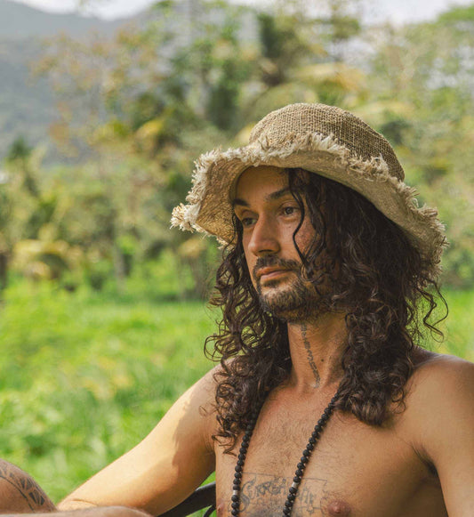 Eco-friendly hemp hat for sun protection and style, featuring a wide brim and natural fibers.