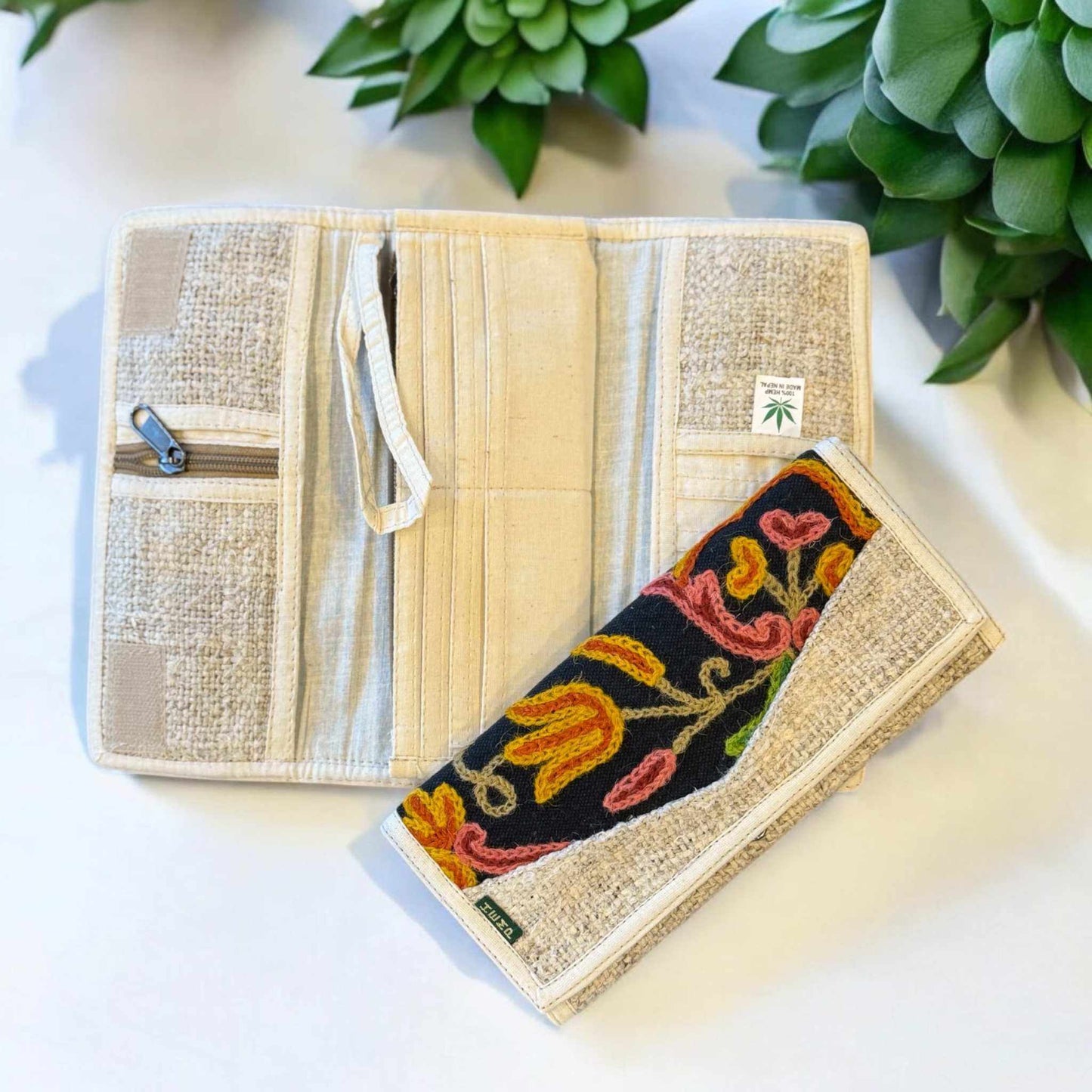 Hemp wallet with floral embroidery, tri-fold design, eco-friendly, handmade artisanal purse.