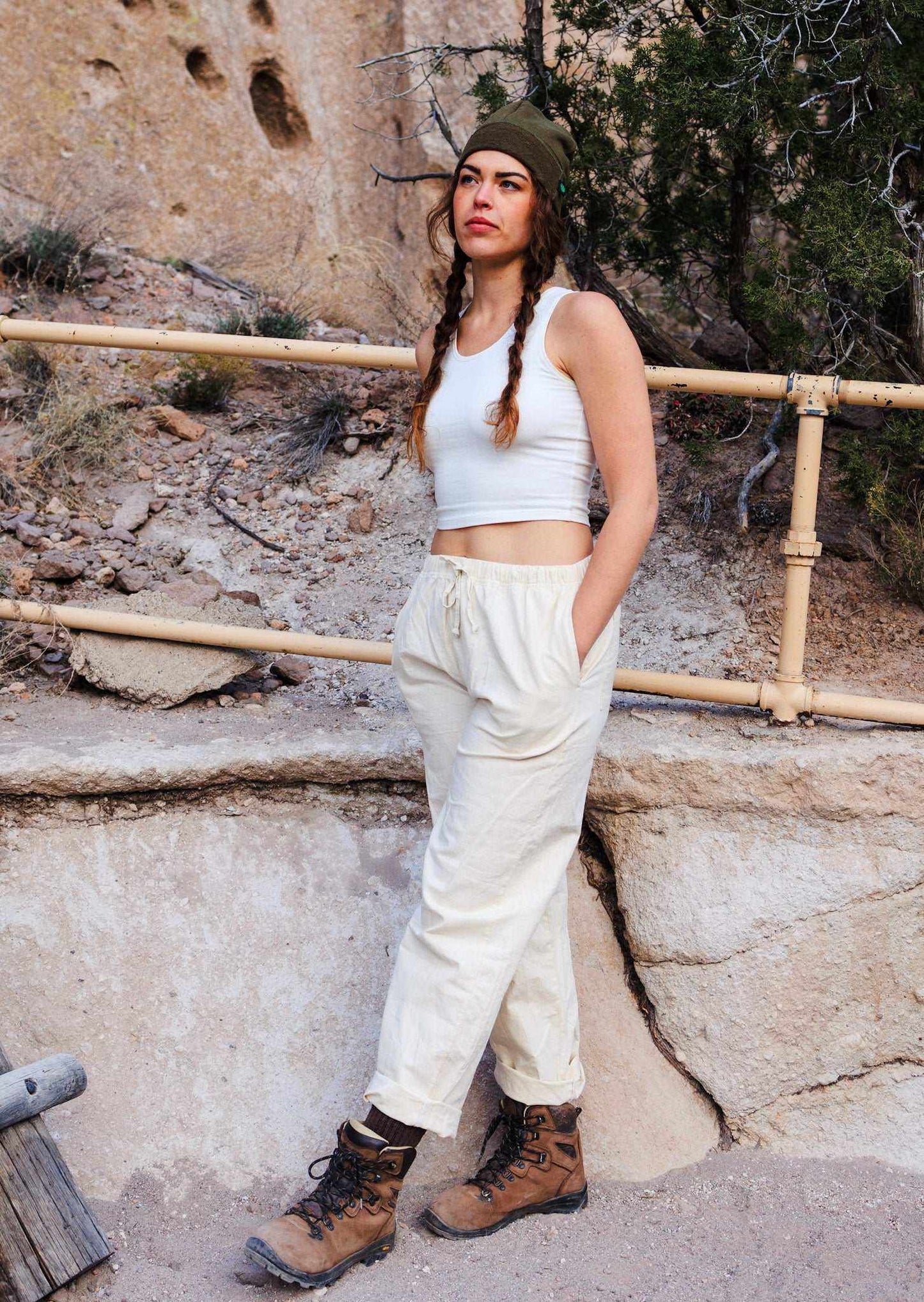 Unisex hemp linen and organic cotton pants in linen white with elastic waistband, styled for outdoor wear.