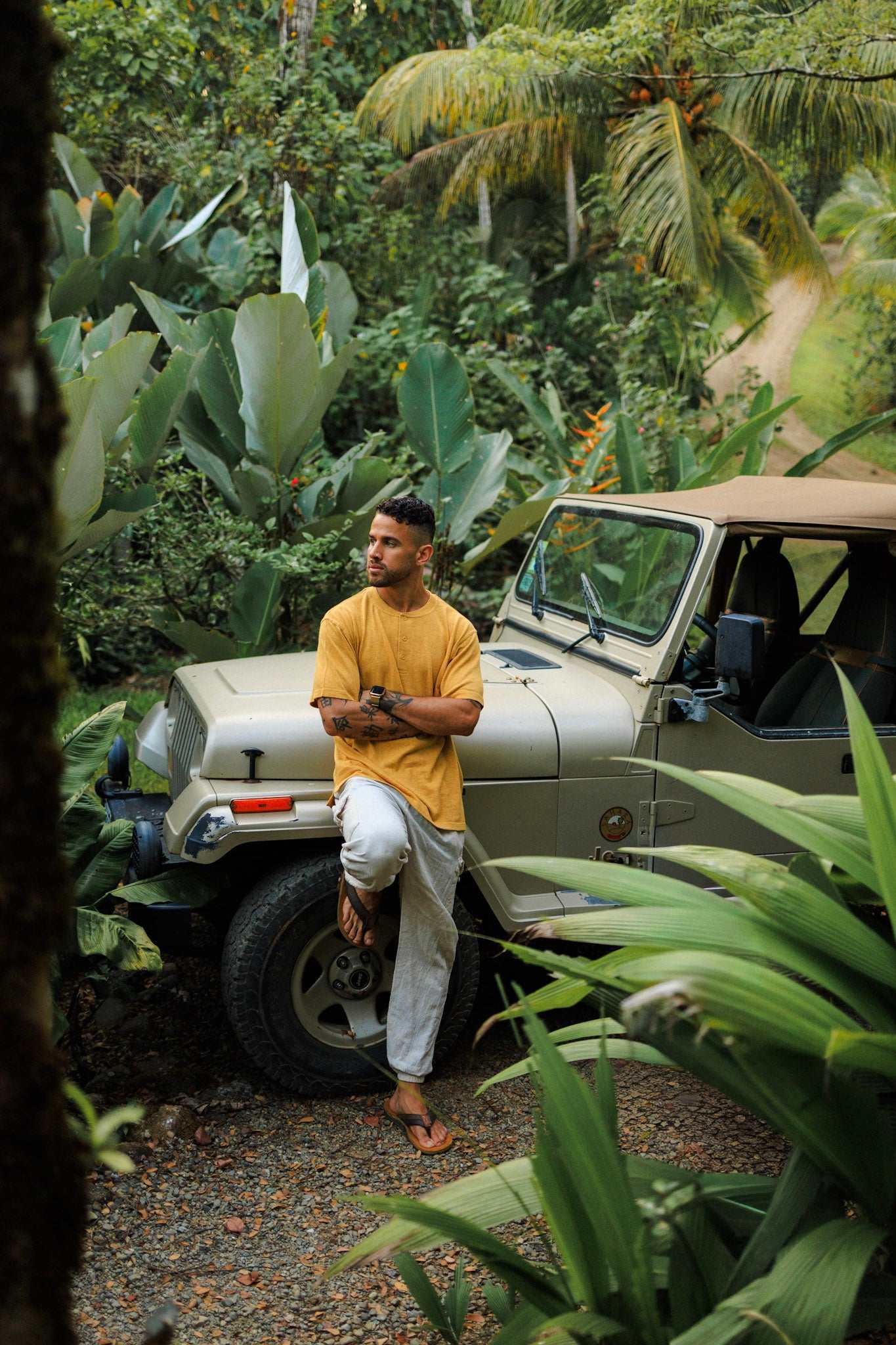 Mustard yellow hemp and organic cotton blend henley shirt with 3-button neckline and relaxed fit for breathable, lightweight summer wear