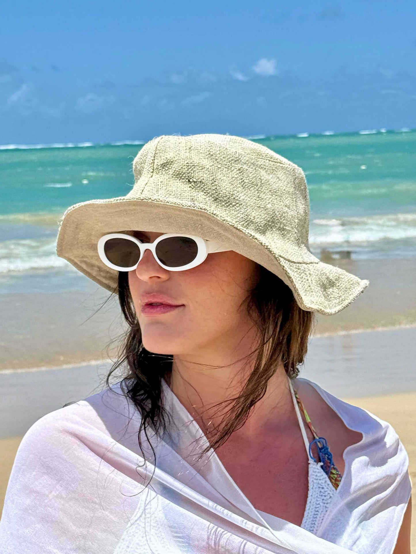 Eco-friendly handmade hemp hat in natural color, wide brim, perfect for sun protection, unisex design.