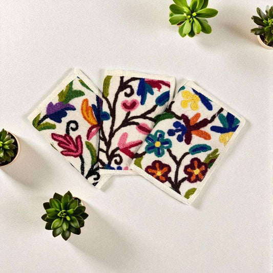 Sustainable handmade hemp floral embroidered passport covers with colorful botanical designs by Asatre