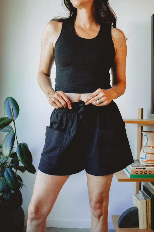 Comfortable Hemp Shorts Women Elastic Waist Casual Wear Organic Cotton Blend Black Loungewear Bottoms Relaxed Fit Design Side Pockets Summer Clothing Breathable Fabric Drawstring Closure Sustainable Fashion Choice Mid Thigh Length Everyday