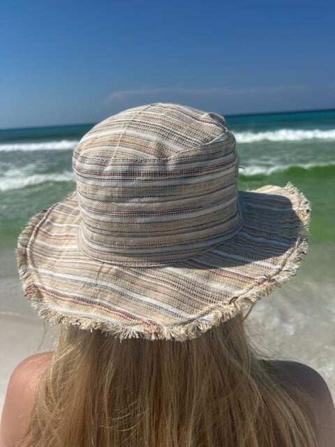 Eco-friendly handmade hemp linen sun hat with wide brim for sun protection, neutral stripes, unisex, ideal for outdoor wear.