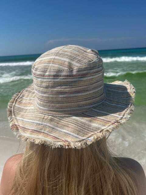 Eco-friendly handmade hemp linen sun hat with wide brim for sun protection, neutral stripes, unisex, ideal for outdoor wear.