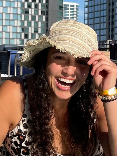 Hemp linen sun hat with wide brim and striped design worn outdoors