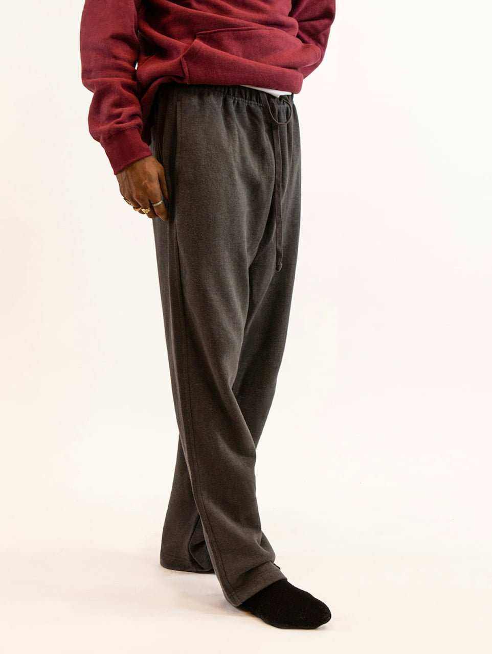 Men's tall hemp pants in dark gray organic cotton fleece with elastic waistband and pockets, eco-friendly and comfortable
