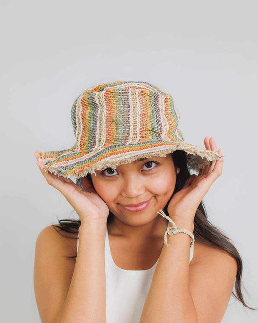 Hemp sun hat with rainbow stripes, ideal for beach and outdoor activities, UV resistant, 100% hemp with cotton lining.