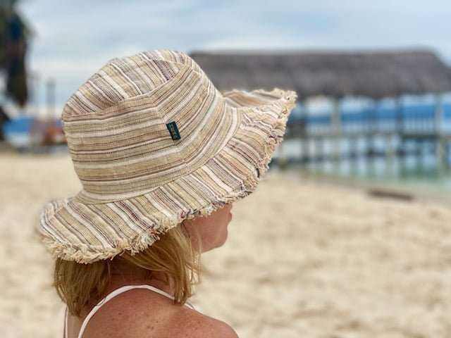 Eco-friendly handmade hemp linen sun hat with wide brim, perfect for sun protection and outdoor wear.
