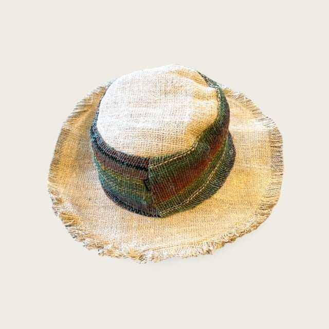 Eco-friendly hemp hat with wide brim for sun protection, unisex design, and packable for travel.