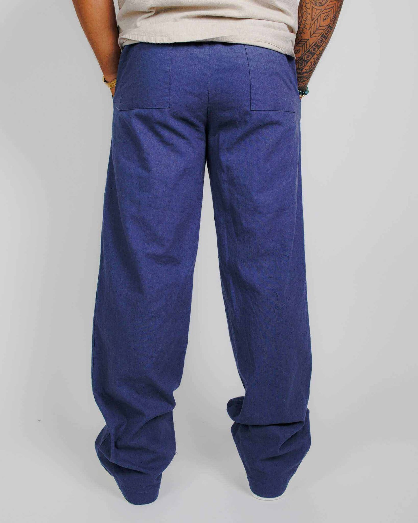 Unisex hemp linen and organic cotton pants in navy blue with relaxed fit and elastic waistband.