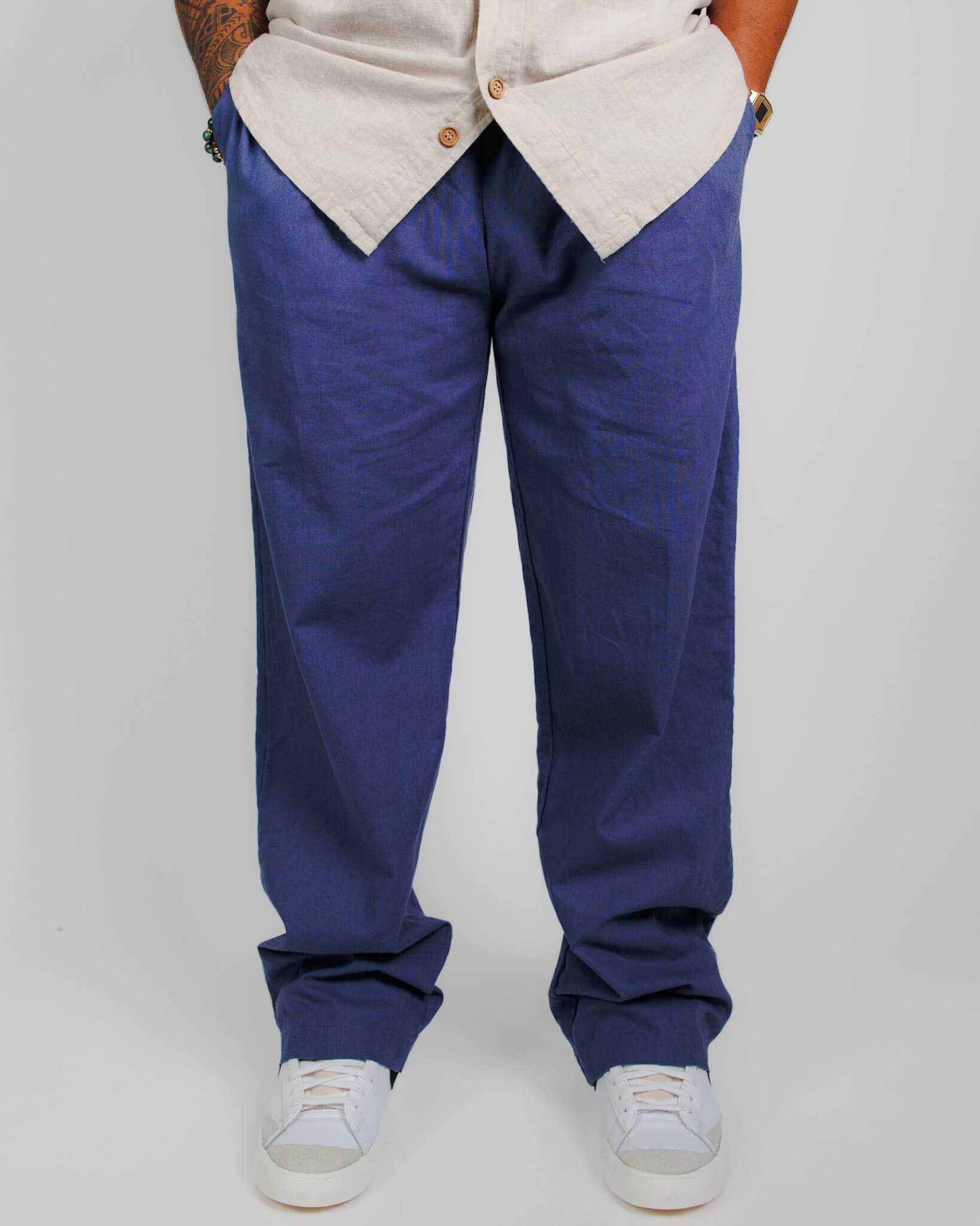 Unisex hemp linen and organic cotton pants in blue, showcasing a relaxed fit and breathable fabric.