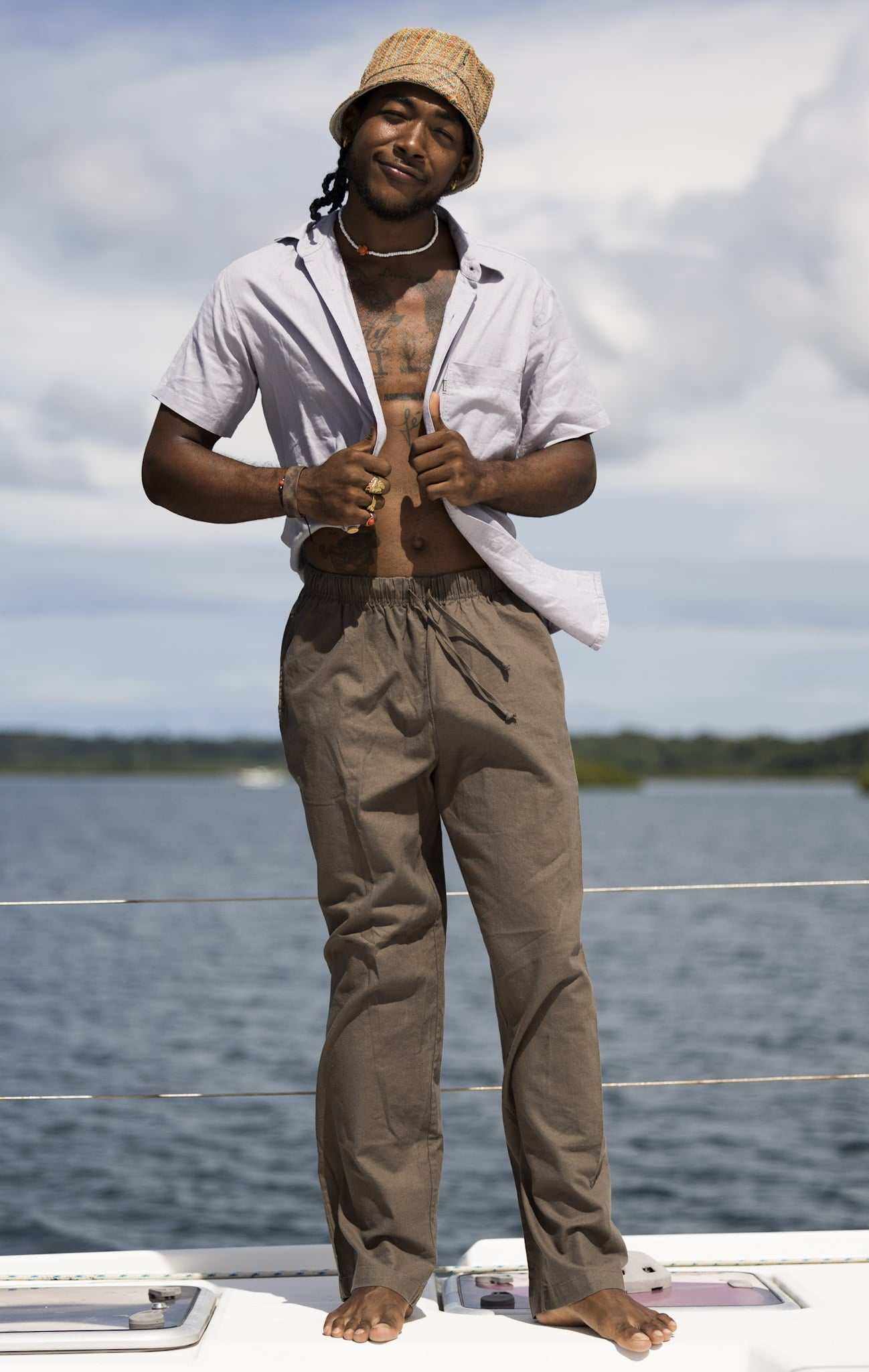 Unisex hemp linen and organic cotton pants in taupe with elastic waistband, perfect for casual wear and eco-conscious style.