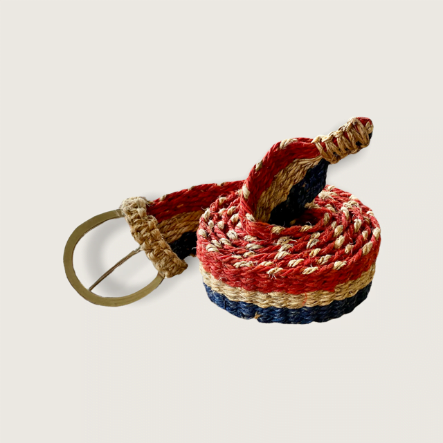 Handmade Himalayan hemp belt in red, white, and blue with traditional buckle