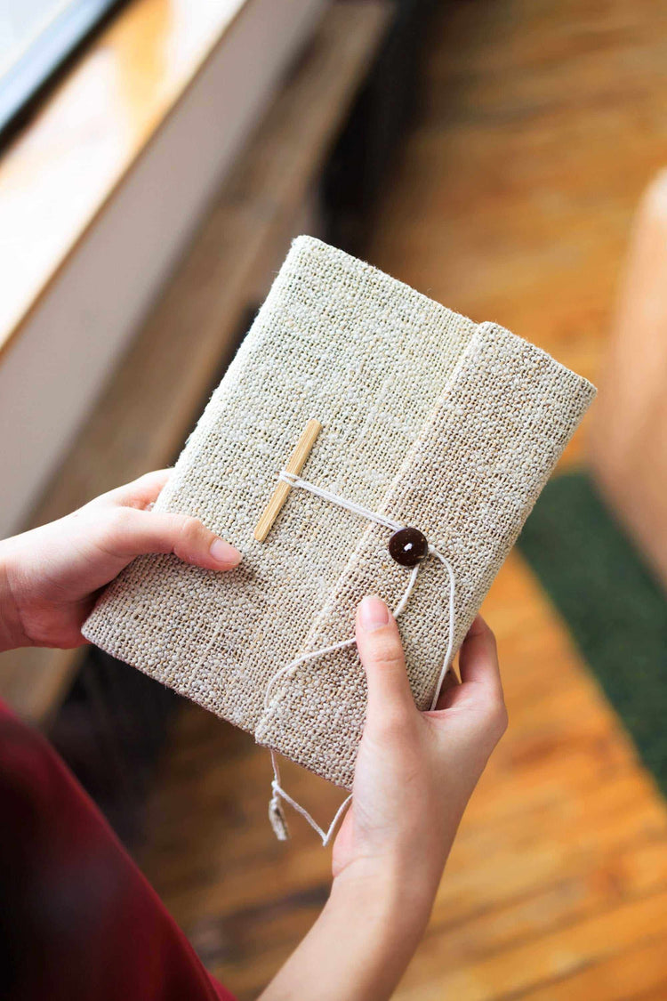 Collection of hemp journals, notebooks, and eco-friendly paper goods for sustainable writing and journaling