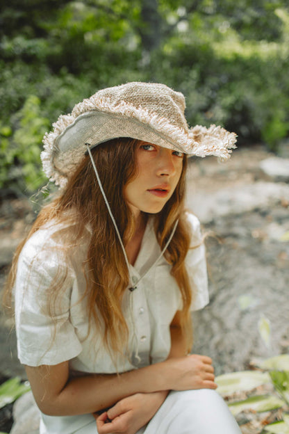 Unisex hemp safari hat with wide brim and adjustable chin strap for sun protection and eco-friendly travel