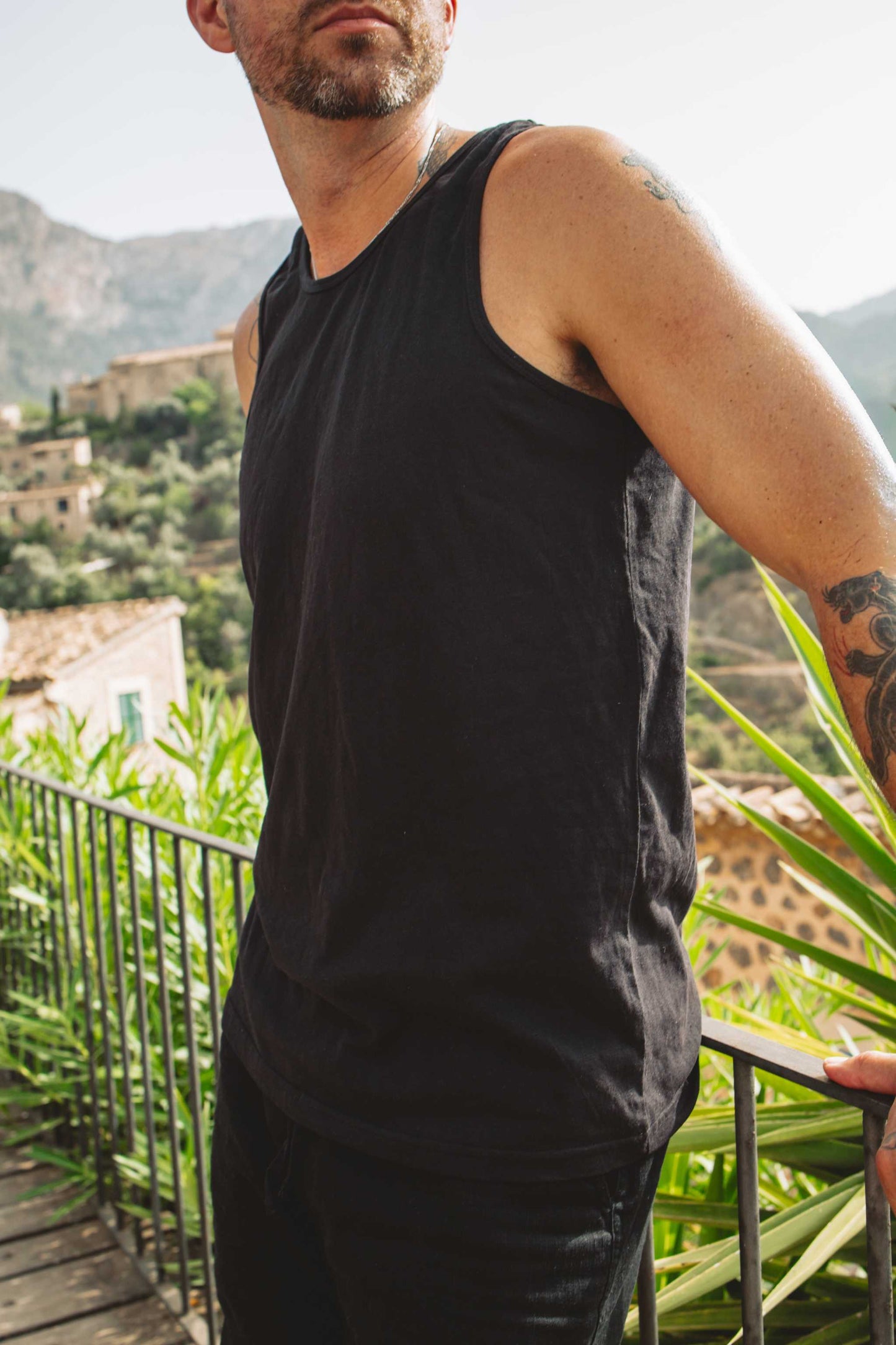 Men's hemp tank top in black, lightweight and breathable blend for workout and yoga sessions