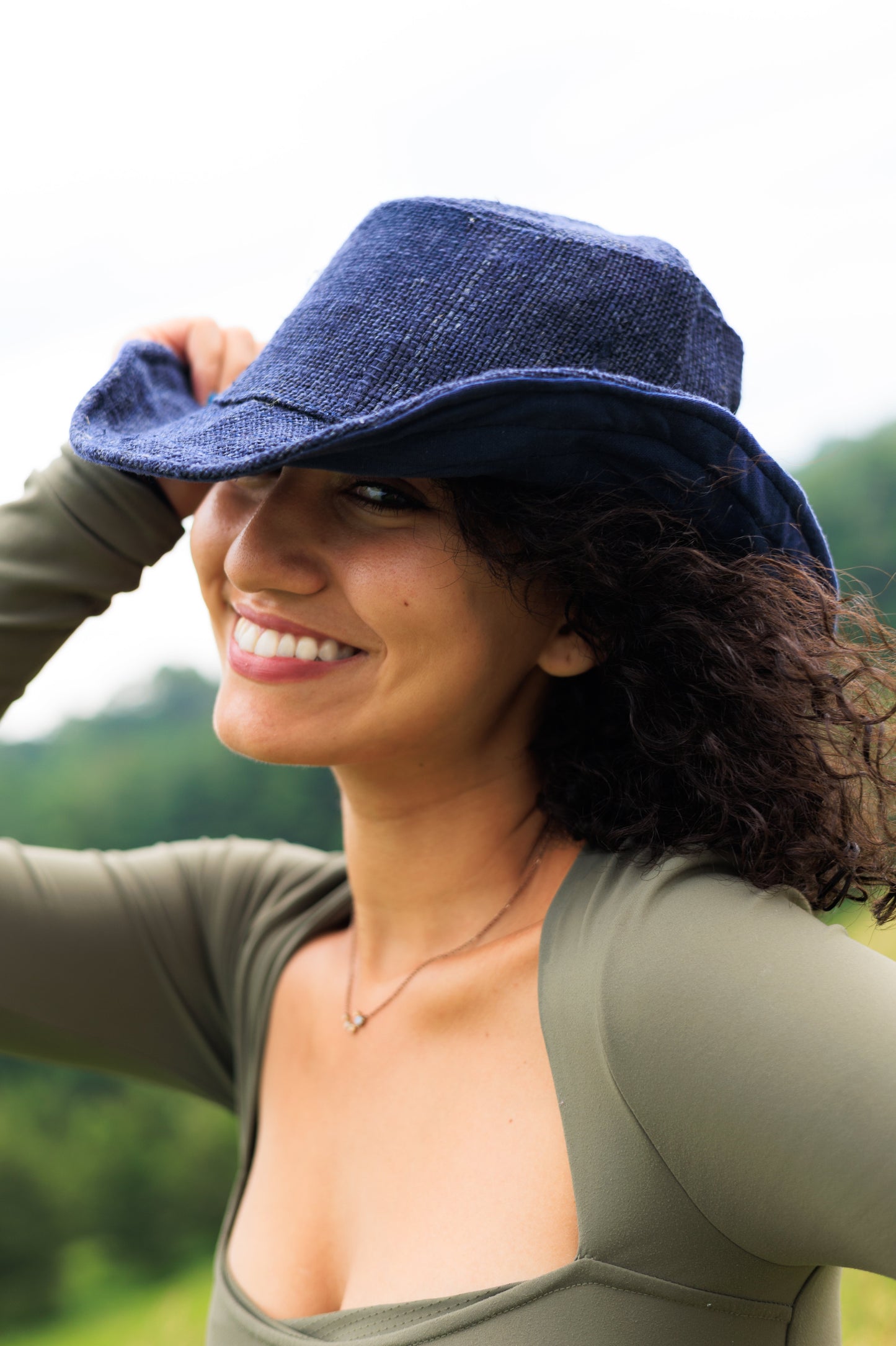 Wide brim sun hat in navy, 100% hemp, with flexible wire brim for sun protection.