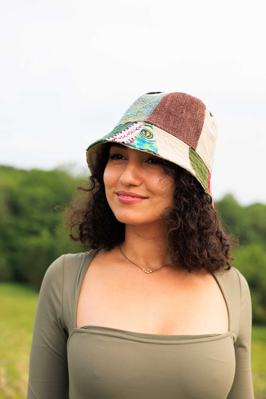 Eco-friendly hemp patchwork bucket hat worn outdoors.
