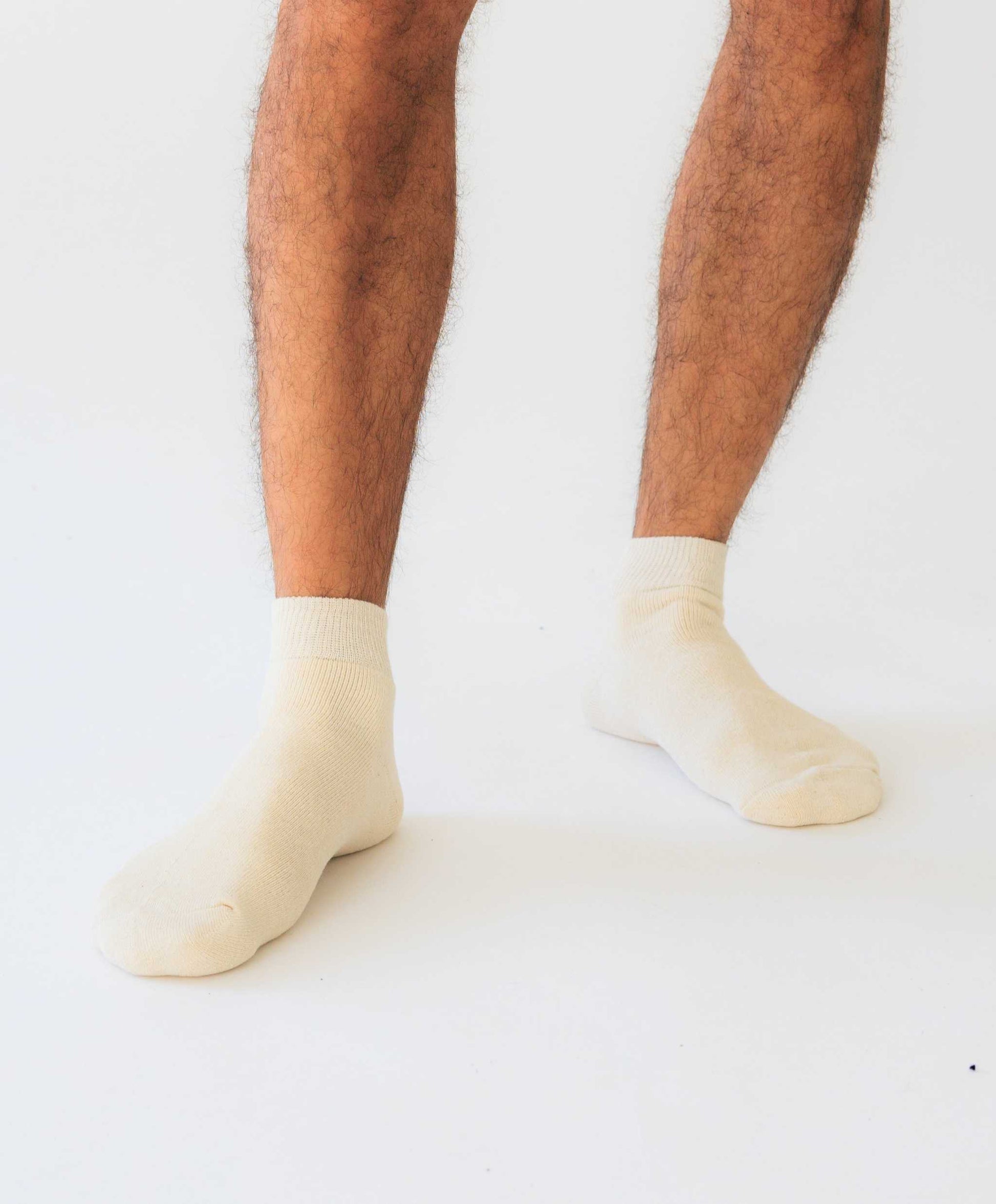 Men's hemp socks in natural color, made with organic cotton, shown as ankle socks for comfort and eco-friendliness.