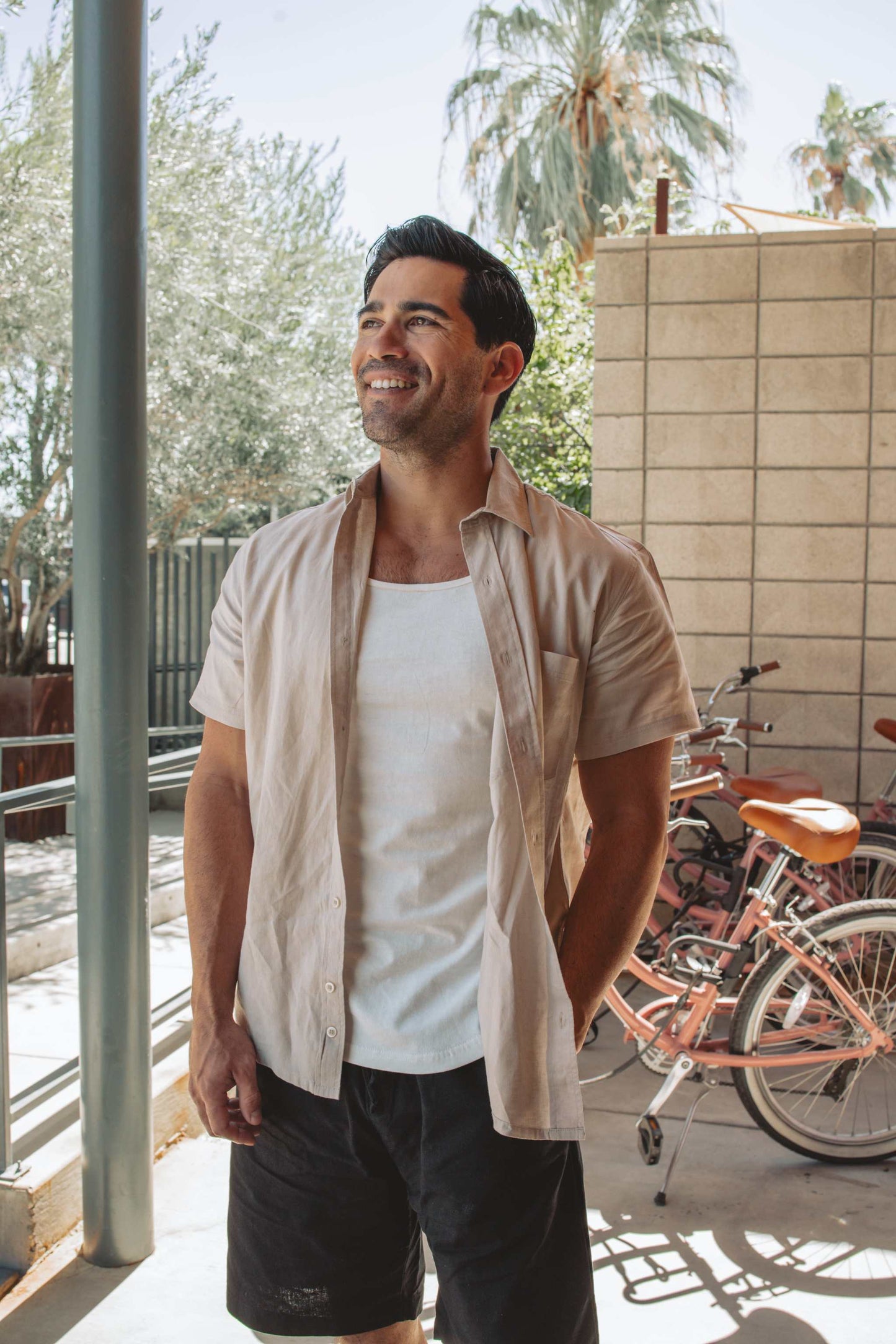 Men's eco-friendly hemp and cotton camp shirt with wood buttons and chest pocket labeled "HEMP" in gray color