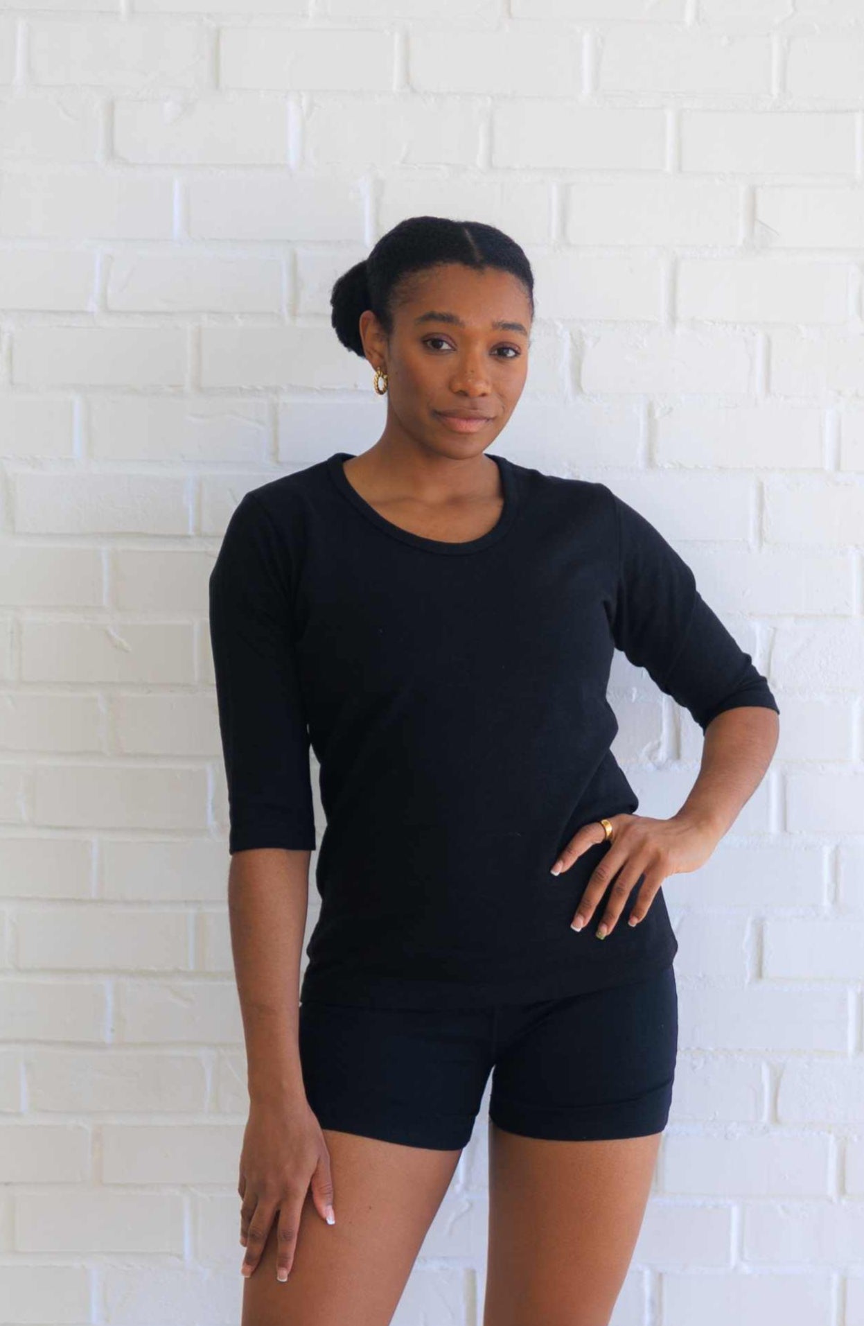 Women's hemp shirt with scoop collar and 3/4 sleeves in black.