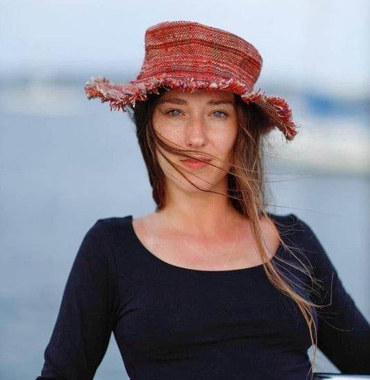 Eco-friendly breathable hemp sun hat in green, purple, and red with natural UV protection and lightweight design