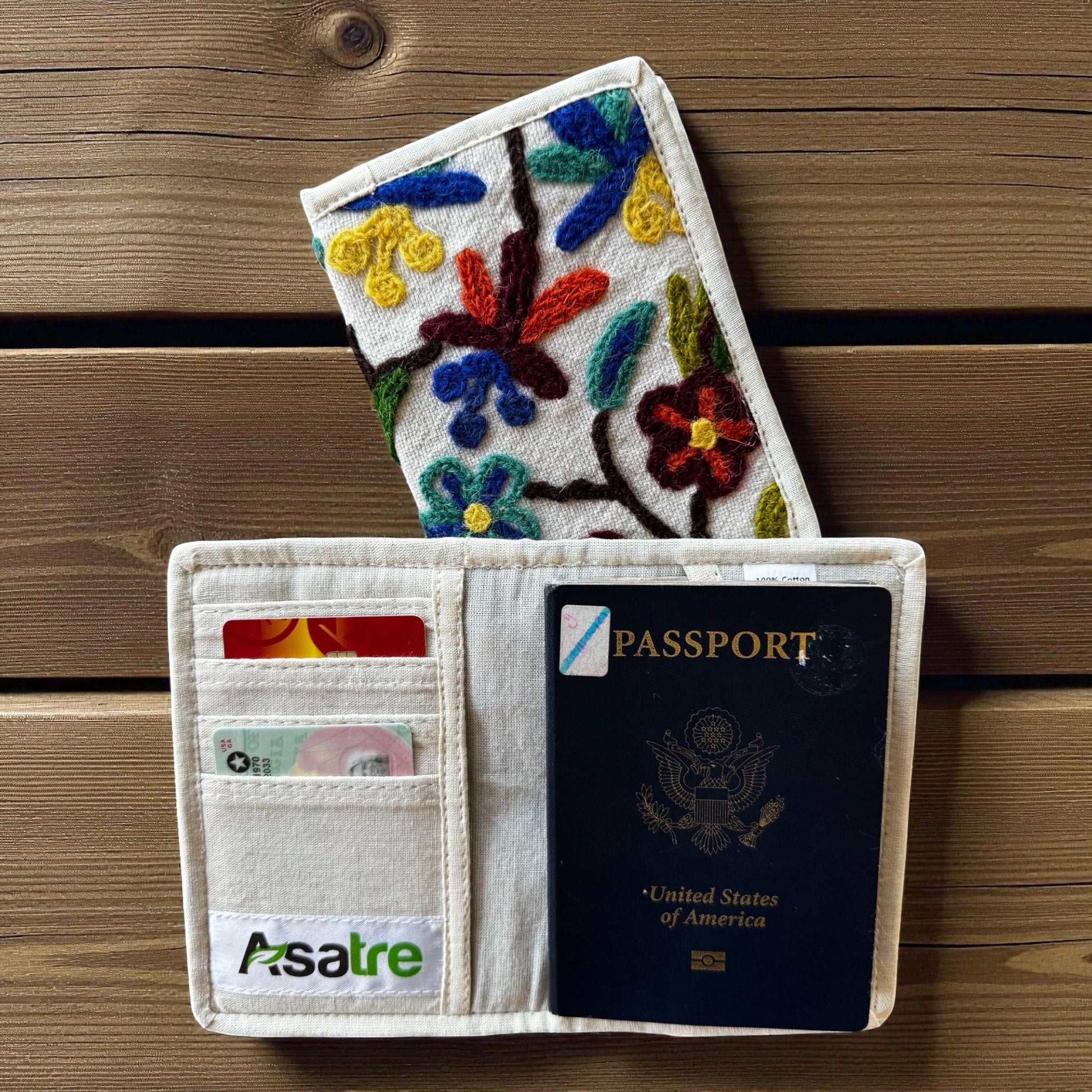 Hemp floral embroidered passport cover handmade in Nepal by Asatre with colorful floral design and eco-friendly sustainable materials