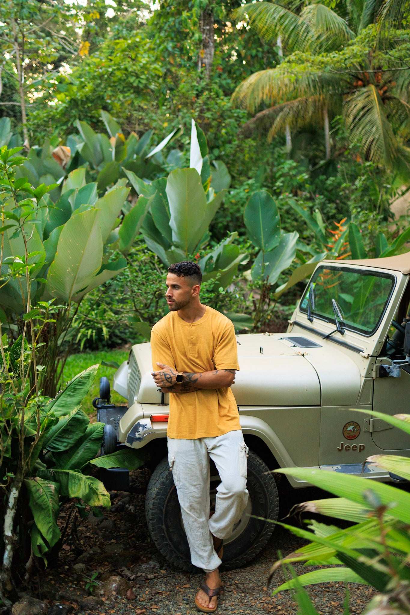 Mustard yellow hemp t-shirt with 3-button henley neckline made from organic cotton blend, lightweight and breathable.