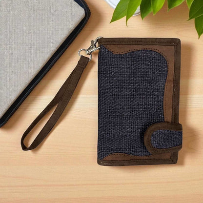 Handmade navy hemp wallet with brown trim and detachable wrist strap, eco-friendly and durable design