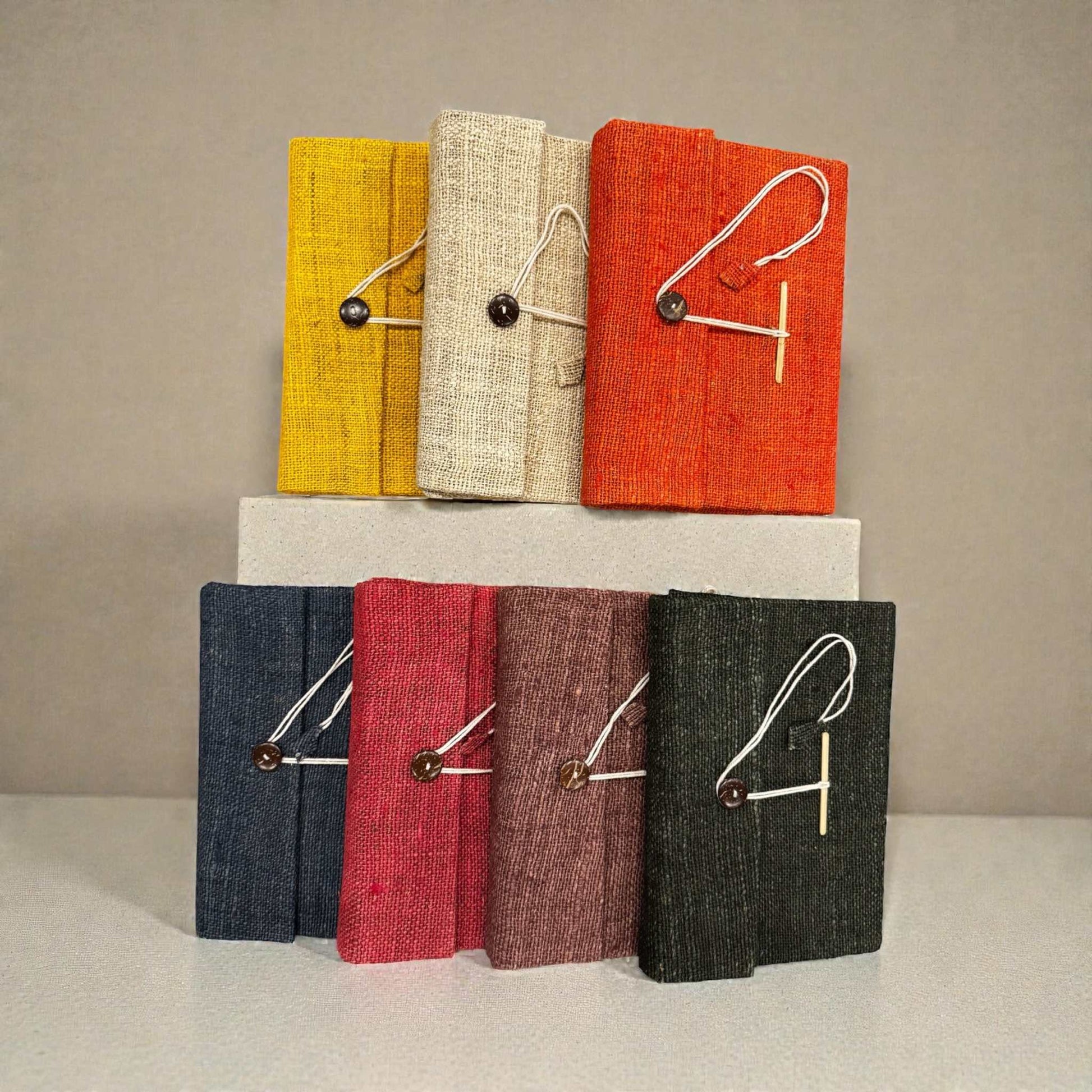 Eco-friendly hemp fabric notebook journal with handmade recycled paper and cotton string closure