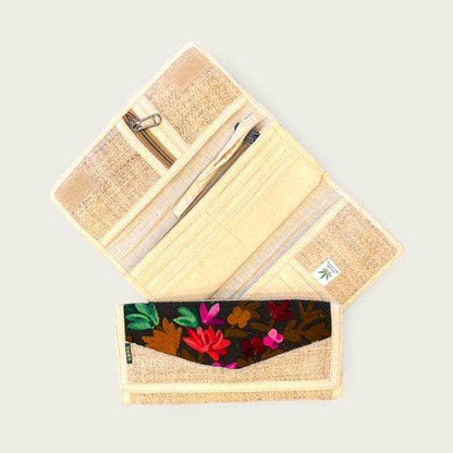 Eco-friendly women's hemp wallet with floral embroidery, showing tri-fold design and multiple compartments.