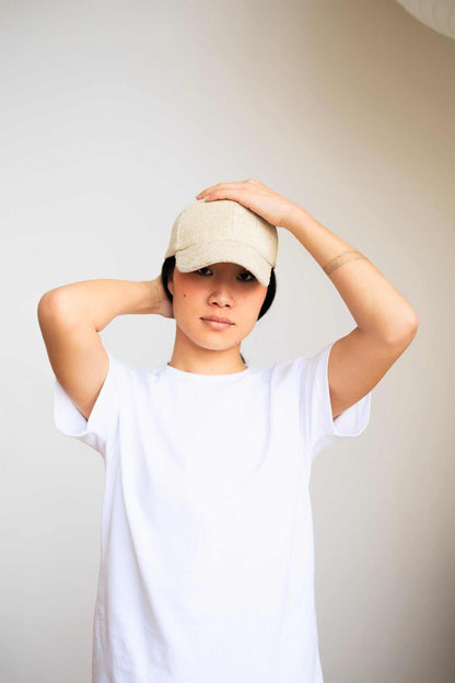 Unisex hemp t-shirt made from breathable eco-friendly hemp and organic cotton blend in brown, white, and red colors