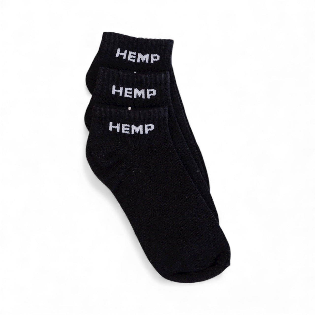 Three-pack of black hemp ankle socks with "HEMP" branding, eco-friendly and handmade in Nepal.
