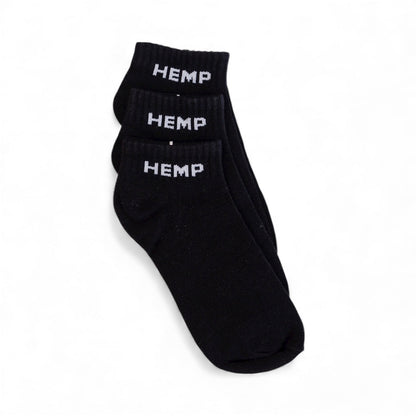 Three-pack of black hemp ankle socks with "HEMP" branding, eco-friendly and handmade in Nepal.