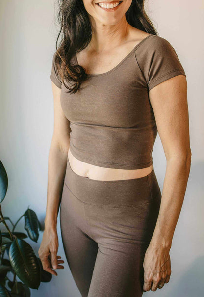 Cotton Crop Top in muted brown stretch fabric with short sleeves, a scoop neckline and fitted cropped hem