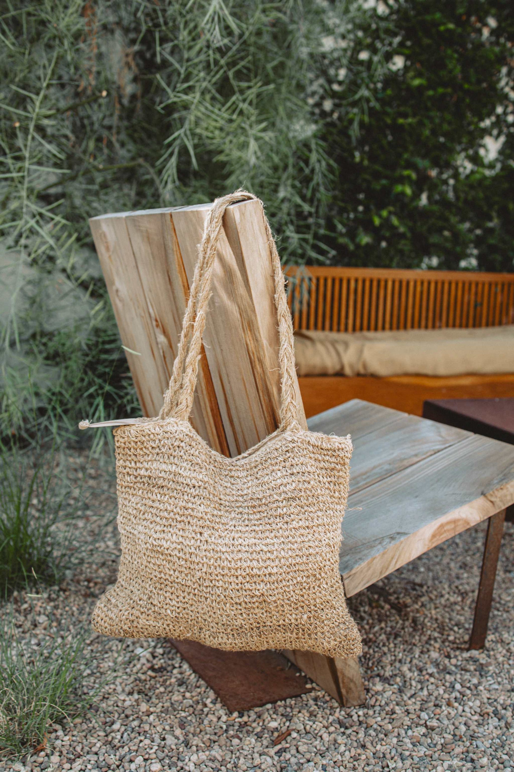Handwoven natural hemp shoulder bag with braided straps, eco-friendly and lightweight tote for everyday use