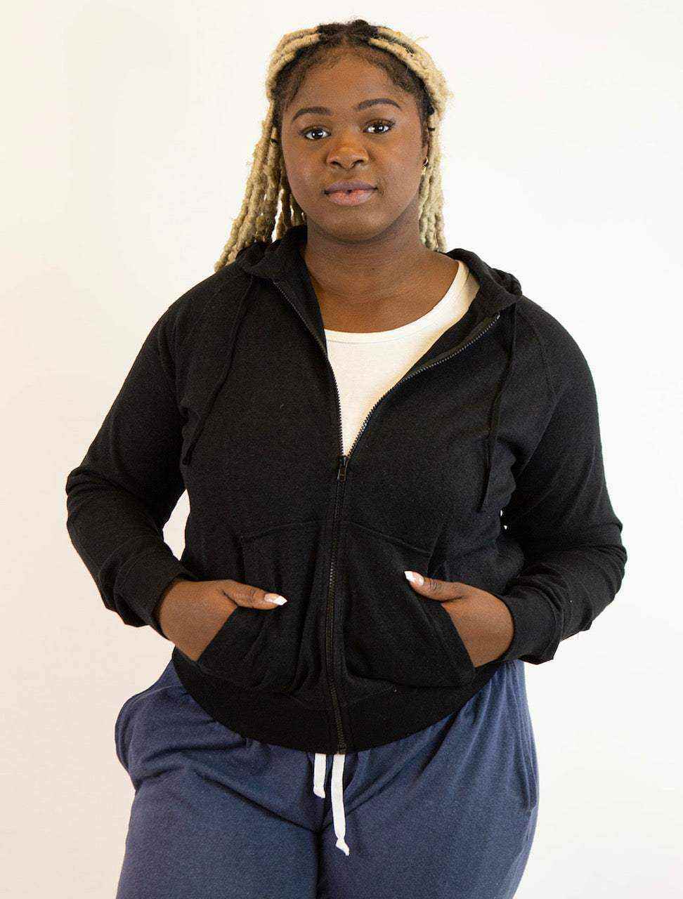 Hemp hoodie in black with a full-zip front, drawstring hood, long sleeves, and front pockets.