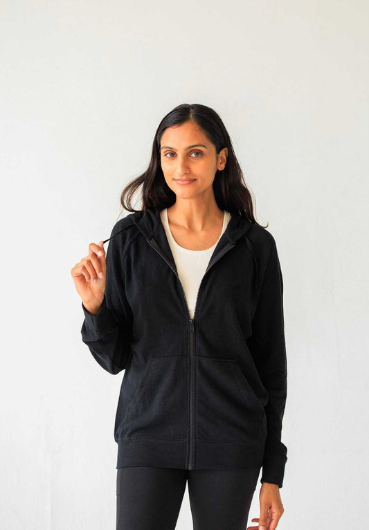Hemp hoodie in black with a soft-looking plain fabric, full zip front, drawstring hood and front pockets