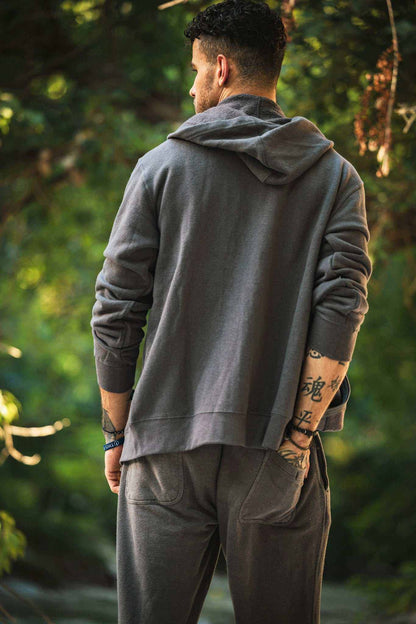 Hemp Hoodie in charcoal gray cotton-blend fabric, shown from behind with a hood, long sleeves, and ribbed cuffs