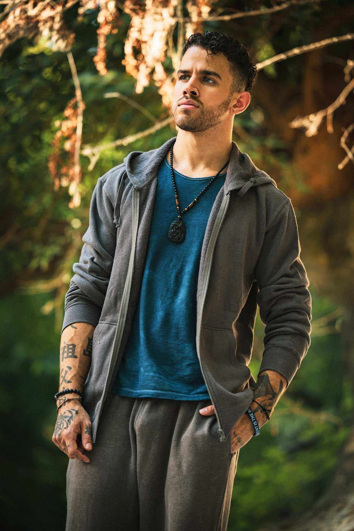 Hemp Hoodie in charcoal gray, soft-looking fabric with a full front zipper, drawstring hood and kangaroo pockets