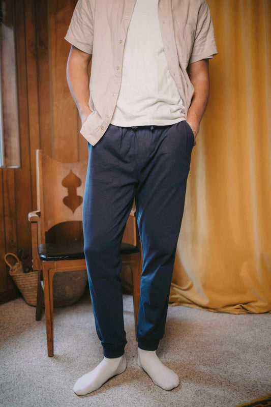 Hemp Jogger in dark navy jersey with a relaxed tapered fit, elastic drawstring waist, side pockets and cuffed ankles