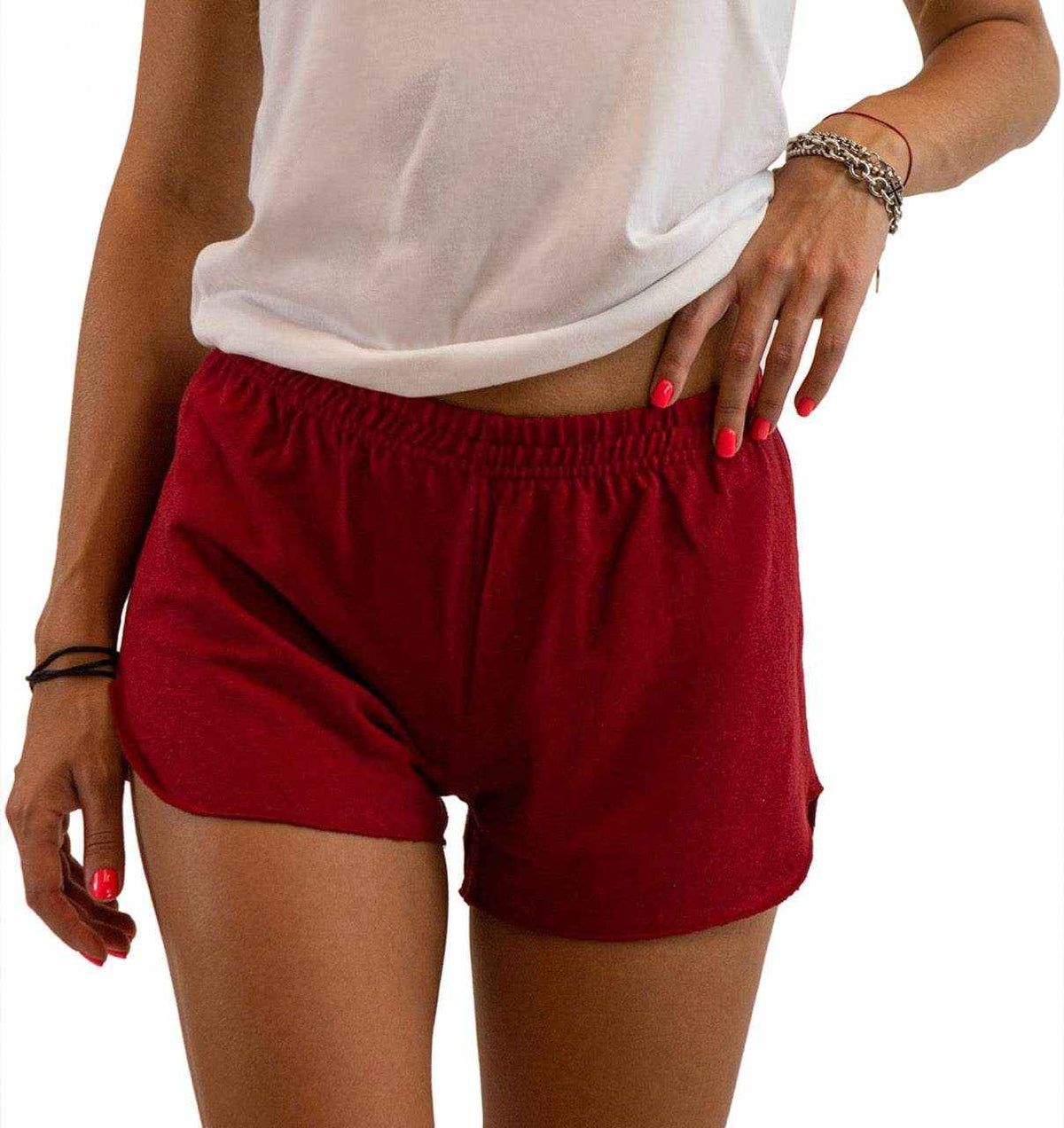 Hemp running shorts in deep red jersey with an elastic waistband, relaxed fit, and curved hems